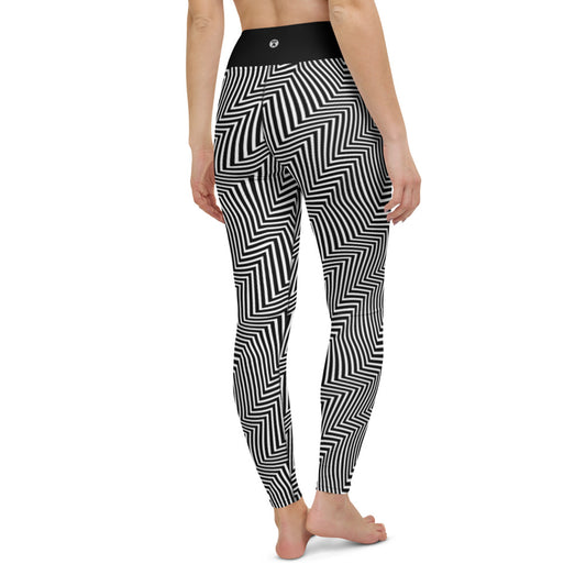 Woman's backside in black and white yoga pants